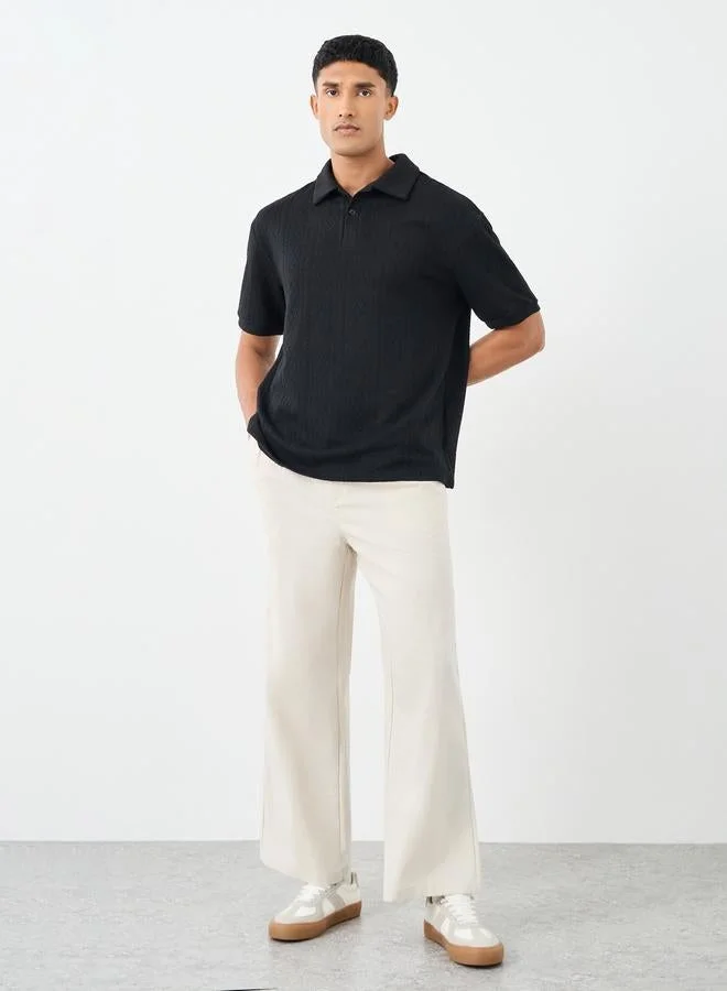 ستايلي ستايلي بولو كبير الحجم بياقة ريفير محبوك بنسيج كابل فاخر